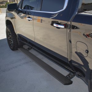 Chevrolet Silverado 1500 Electric Running Boards - Go Rhino - VoltStep Electric, Dual-Motor, 6-inch Aluminum with Integrated LED and Magnetically-Activated Door Switches - Textured Black - `19-`25